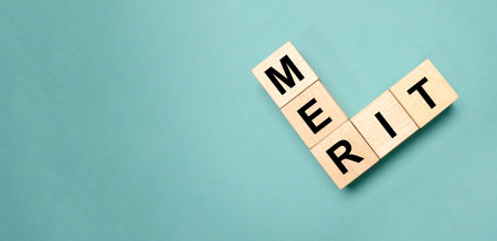 MERIT; Wooden blocks with "MERIT" text of concept.の写真素材