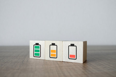 Burnout syndrome at work concept. Low energy battery. Emotional, physical, and mental exhaustionの写真素材