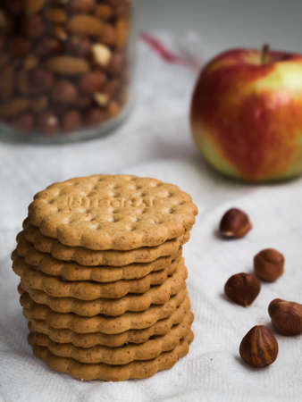 Whole grains biscuits snack with hazelnuts and apple