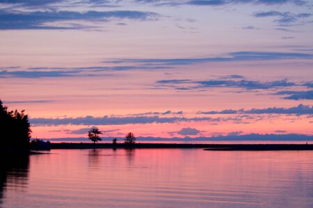 the sunset at Lake Baikal in summer timeの写真素材