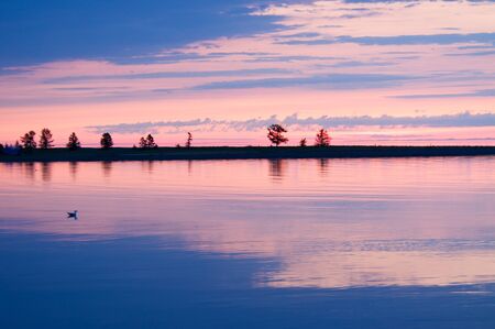 the sunset at Lake Baikal in summer timeの写真素材