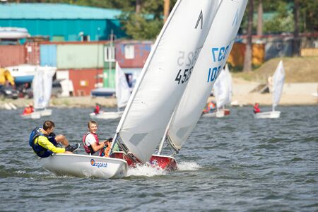 NOVOSIBIRSK,RUSSIA-JULY12:Sailing Regatta, Inter-regional competition to support children's sailing Siberiariver-2015 July12, sailing kids, 2015 in Novosibirsk, Russiaのeditorial素材