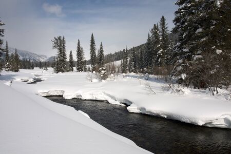 Unfrozen mountain river with blue water, Russiaの写真素材