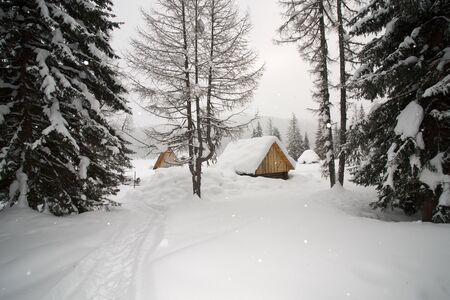 View of traditional old wooden house in winterの写真素材