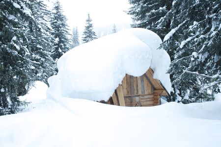 View of traditional old wooden house in winter