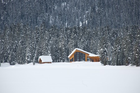 View of traditional old wooden house in winterの写真素材