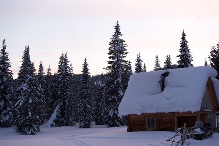 View of traditional old wooden house in winterの写真素材