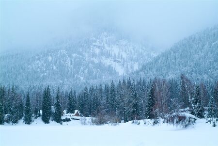 View of traditional old wooden house in winterの写真素材