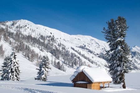 View of traditional old wooden house in winterの写真素材