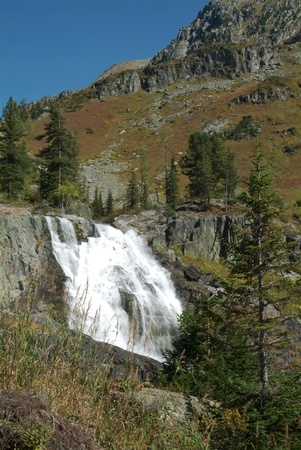 Nice view of the mountains and blue sky waterfallの写真素材