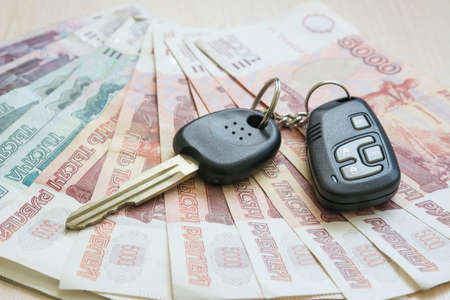 Russian Ruble and car keys on the tableの写真素材
