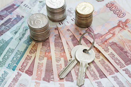Russian Ruble and the  apartment keys on the tableの写真素材