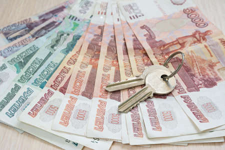 Russian Ruble and the  apartment keys on the table
