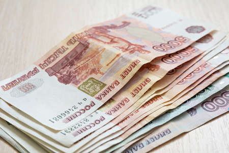 Russian ruble banknotes laid out on the table