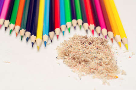 colored pencils and shavings from themの写真素材