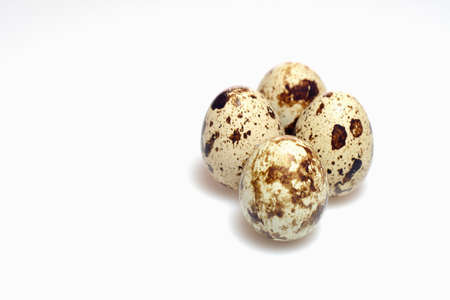 quail eggs on a white background