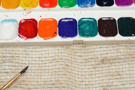 gouache paint tassel and canvas materialの写真素材