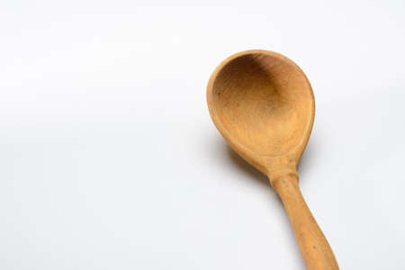 wooden spoon on white background