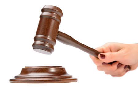 the hammer of the auctioneer in hand