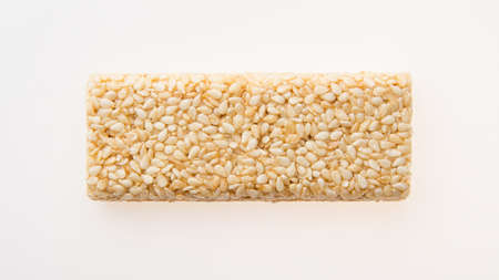 sesame seeds in caramel in the form of a barの写真素材