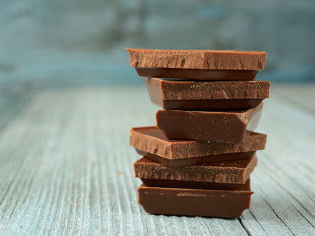 pieces of chocolate lie on top of each otherの写真素材