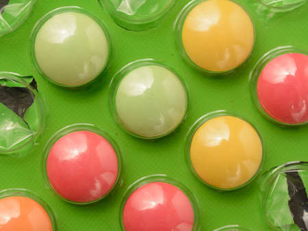 multicolored tablets in a package