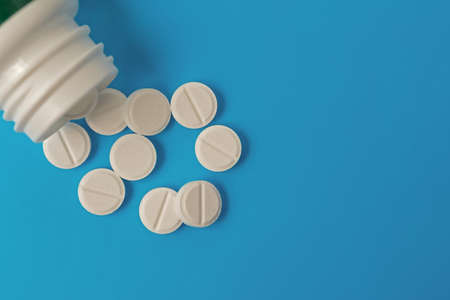 the tablets are on a blue surfaceの写真素材