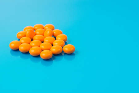 the tablets are on a blue surfaceの写真素材