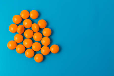 the tablets are on a blue surfaceの写真素材