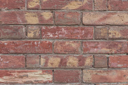 Old red brick wall texture background. Close viewの写真素材