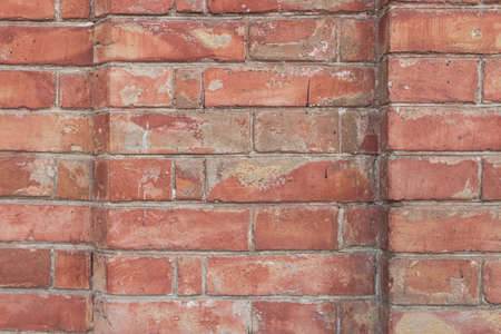 Old red brick wall texture background. Close viewの写真素材