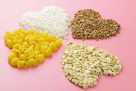cereals hearts shape from pasta, rice and oats, valentines day backgroundの写真素材