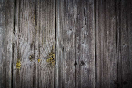 old wooden background aligned vertically, design workplace.の写真素材