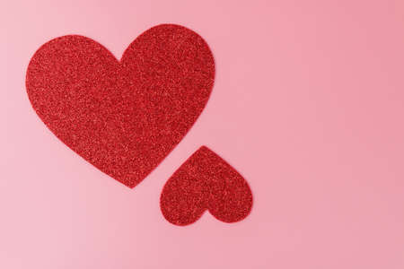 valentines day background with two hearts different size small and big.の写真素材