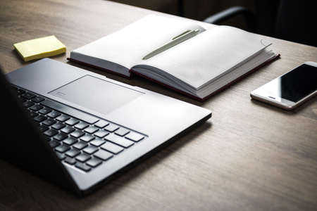 close up freelancer's work desk. minimalist contemporary design.の写真素材