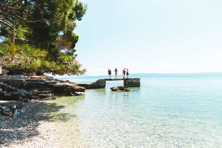 group of friends in vacation enjoying sea and sun. people traveling