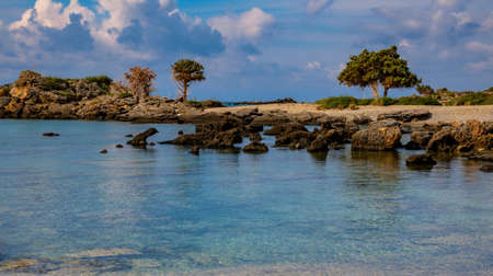 rocky shore. turquoise sea. deserted beach. Elafonisi, Crete, Greeceの写真素材