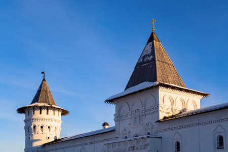 Watchtower of the old fortress of stone with a wooden roofの写真素材