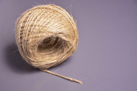 Jute string, roll rope on gray backgroundの写真素材