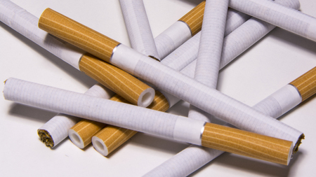 Cigarette on white background, unhealthy lifestyle, toxic nicotine