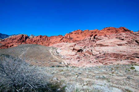 View of dry landscape and red rock formations of the Mojave Desert..の写真素材
