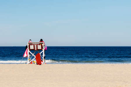 Lifeguards on-duty on a hot summer day at the beach.のeditorial素材