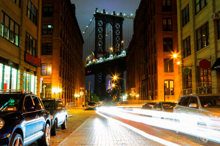 Bright lights of New York City at night.の写真素材