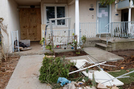 STATEN ISLAND, USA - NOVEMBER 4: The images of devastation caused by the Hurricane Sandy  and rescue services response November 4, 2012 on the streets of Staten Island, USA.のeditorial素材
