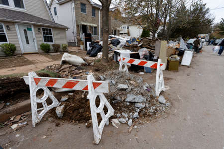 STATEN ISLAND, USA - NOVEMBER 4: The images of devastation caused by the Hurricane Sandy  and rescue services response November 4, 2012 on the streets of Staten Island, USA.のeditorial素材