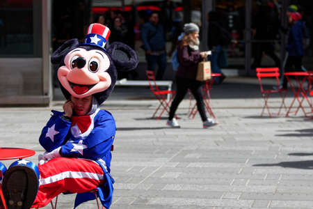 New York City, USA - March 18, 2015: Costumed street character performers on the streets of New York City on March 18, 2015. Costumed characters who pose for pictures with tourists in Times Square could become regulated under a proposed New York City law.のeditorial素材