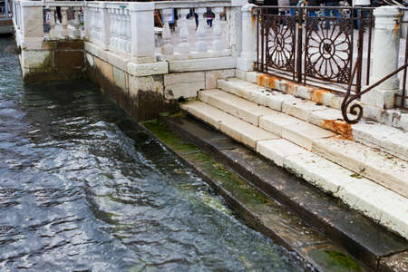 Venice, Italy - April 1, 2013: Street views of canals and ancient architecture in Venice, Italy....