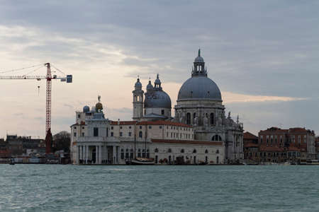 Venice, Italy - April 1, 2013: Street views of canals and ancient architecture in Venice, Italy. Venice is a city in northeastern Italy sited on a group of 118 small islands separated by canals and linked by bridges.のeditorial素材