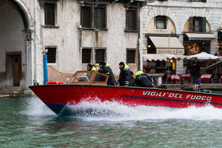Venice, Italy - April 1, 2013: Street views of canals and ancient architecture in Venice, Italy. Venice is a city in northeastern Italy sited on a group of 118 small islands separated by canals and linked by bridges.のeditorial素材