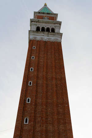 Venice, Italy - April 1, 2013: Street views of ancient architecture in Venice, Italy. Venice is a city in northeastern Italy sited on a group of 118 small islands separated by canals and linked by bridges.のeditorial素材